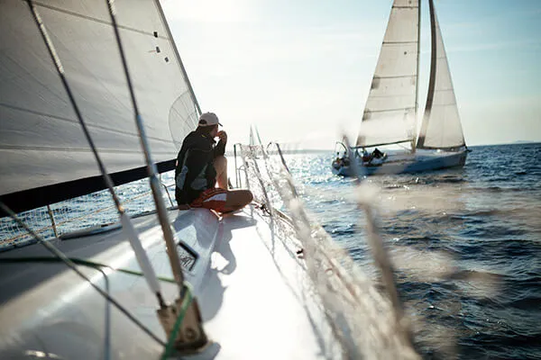 image of a person sitting on a sailboat